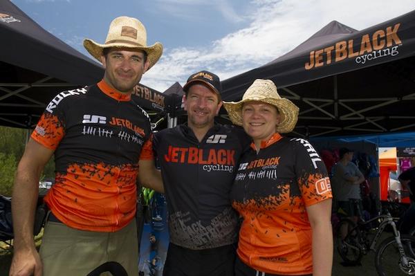 Martin and Juliane Wisata from Rocky Trail Entertainment about to celebrate their 100th event with Tony Simmonds from JetBlack Cycling (centre), major sponsor of the JetBlack 24 Hour since 2009.